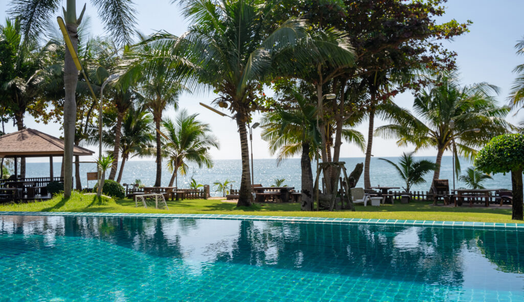 Mauritius tourism Part of swimming pool with background of tropical sea.